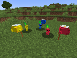 Red, yellow, and blue Pikmin standing next to their corresponding onions