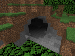 A cave entrance within a forest.