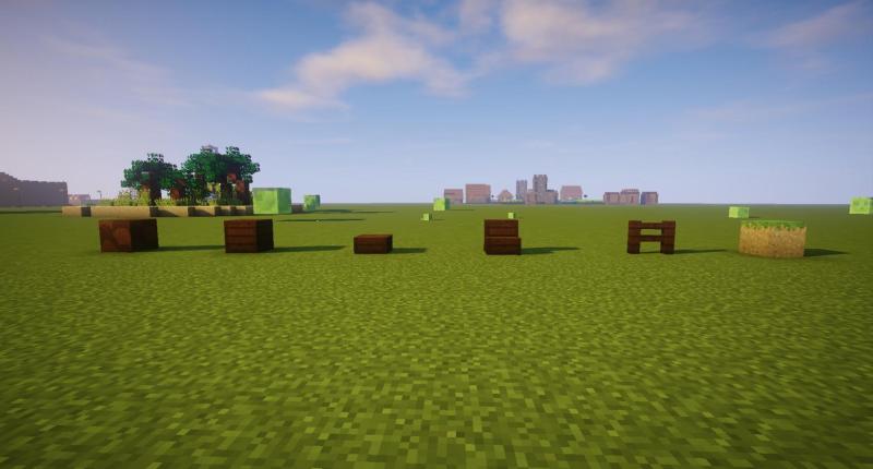 The six new blocks. From left to right: The palm log / the palm planks / the palm slab / the palm staircase / the palm fence / and the cube of sand topped with grass