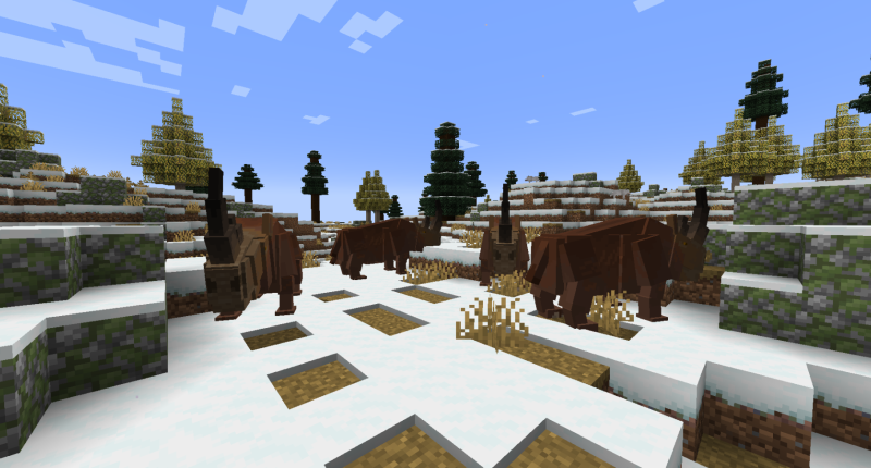 A herd of Woolly Rhinoceros surrounded by sparse trees and snow.
