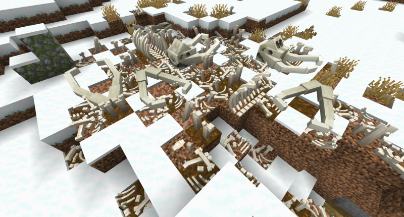 A Mammoth grave site. Dozens of Mammoth bones are partially burried in a snowy landscape.