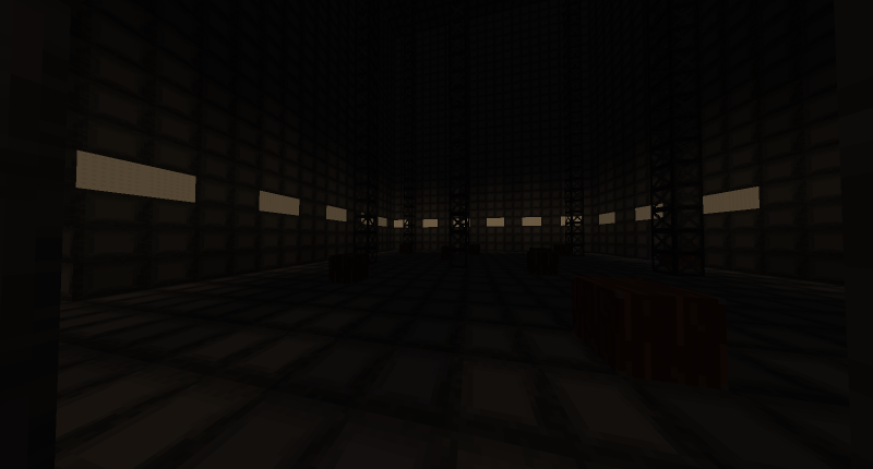 A large metal room with steel beams going to the roof. Dim lights lining the walls. Wooden crates on the floor.