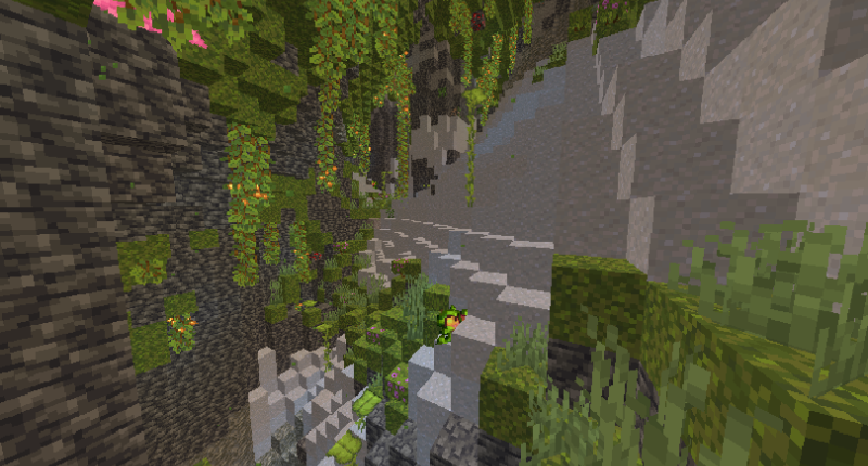 A lush cave containing a hidden Life Fruit underground.