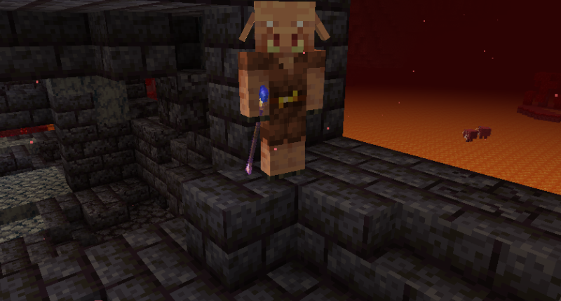 A piglin that spawned with an arcane staff